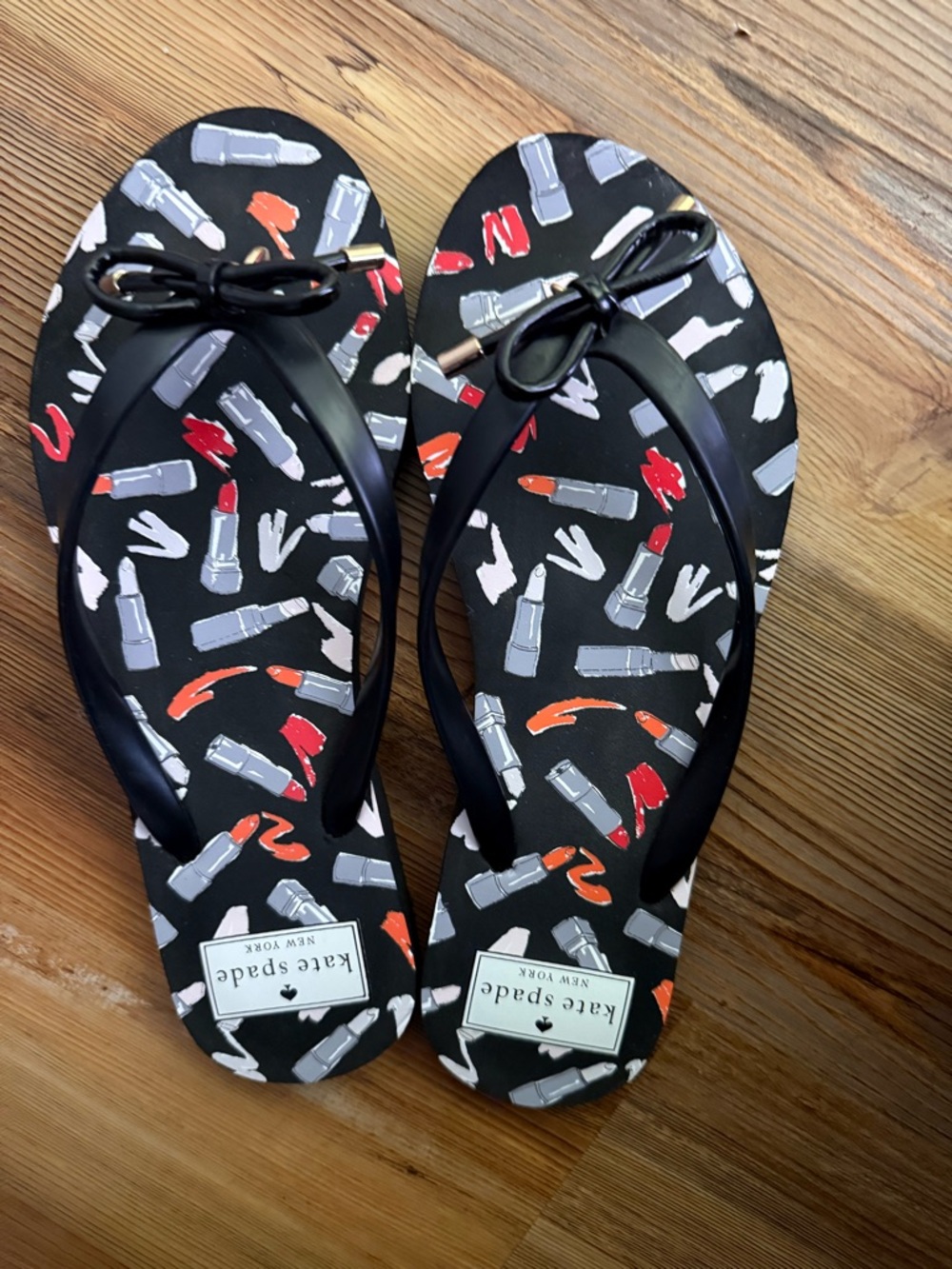 kate spade Black Flip Flops with Lipstick Print and Bow